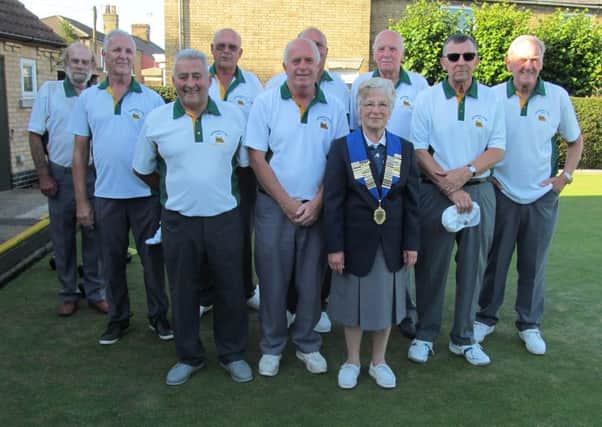 Peterborough & District, winners of the Peterborough Leagues Albert Rowlett Cup, pictured with League president Jean Redhead. (Left to right): Barry Oxborough, Brian Bassam, Jeff Clipston, Cliff Watson, Alec Emery, Mick Greaves, Wilf Redhead, Ivor Jackson, Joe Martin.