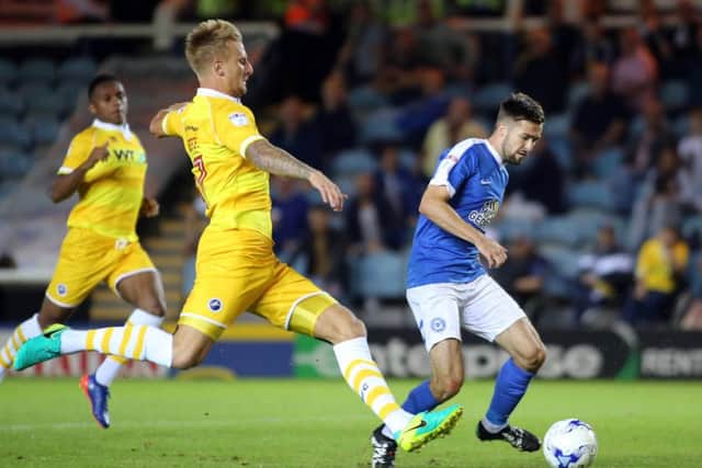 Gwion Edwards of Peterborough United scores his second goal of the game to make it 4-0. Picture: Joe Dent