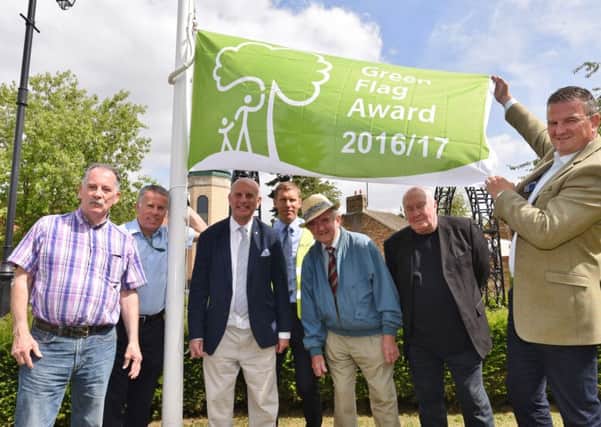 Coun. Gavin Elsey with ward councillors , Victoria Park residents assn members and representative from Amey at the Victoria Park green flag ceremony EMN-160817-003227009