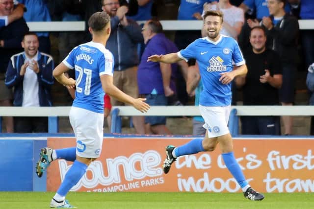 Gwion Edwards (right) faces former club Swansea.