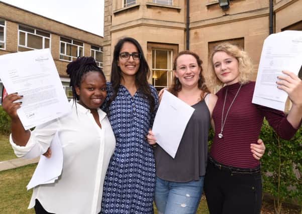 Ropa Mungwari, Maha Nazir, Annalise Jackson and Laurie Fisher getting their results at The Peterborough School