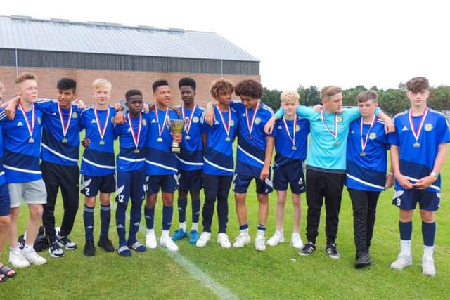 Pictured is the Peterborough Sports Under 15 team after winning a big tournament in Denmark. From the left are Bradley Gilbert, Connor Bell, George Warrington, Nasir Nabi, Josh Dunmore, Tychique Muendo, Taylor Horne, Tayo Akinsanyo, Jazleigh Fife, Sean Spalding, Jay Ward, Lewis Lamberton Pine, Aaron Morling and Louie Venni.