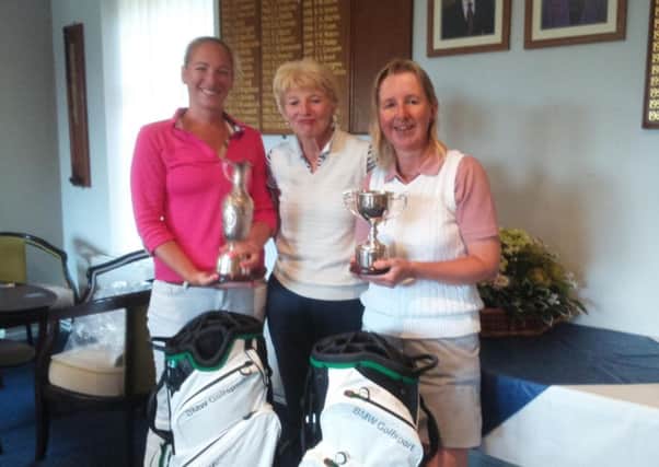 New Milton ladies club champion Georgina Dunn (left) with lady captain Carol Dunn and runner-up Rachael Fisher (right).