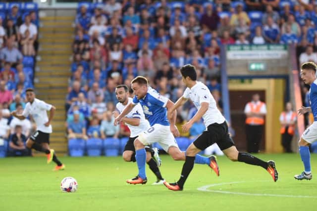 Posh v. Swansea, Paul Taylor in action - photo by David Lowndes