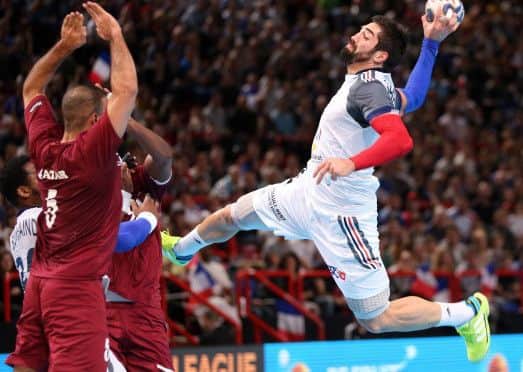 Action from a game of handball.