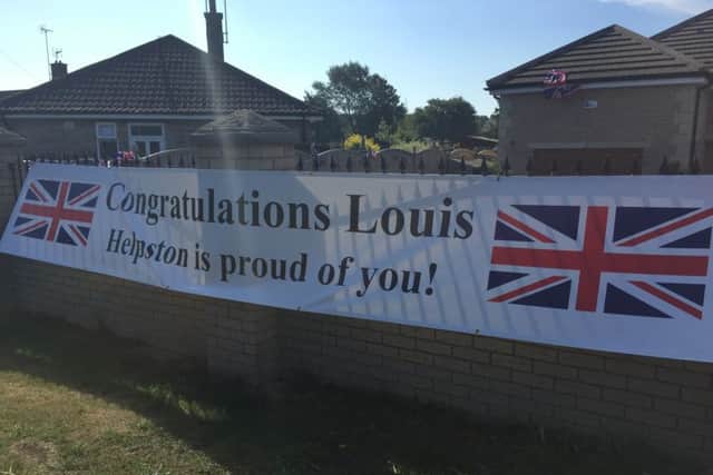 Helpston banner welcoming home Olympic hero Louis Smith.