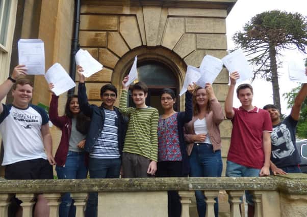 Pupils from The Peterborough School with their GCSE results