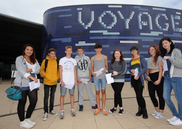 Voyager Academy pupils with their GCSE results in a previous year