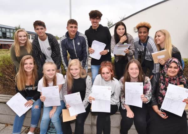GCSE results day 2016 students at St John Fisher Catholic High School EMN-160825-121515009