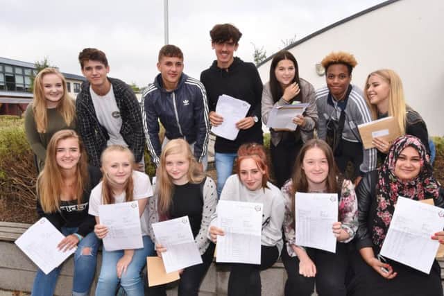 GCSE results day 2016 students at St John Fisher Catholic High School EMN-160825-121515009