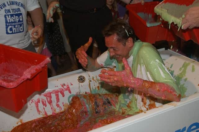 A bean bath for DJ Kev Lawrence at the festival in 2003