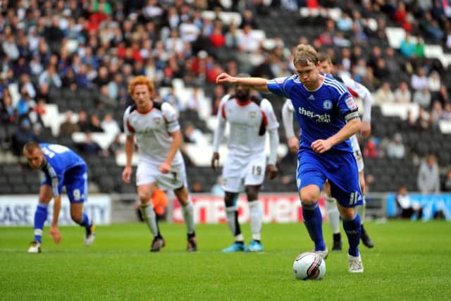 Grant McCann scores a penalty for Posh at MK Dons in a League One play-off semi-final at stadium:mk in 2011.