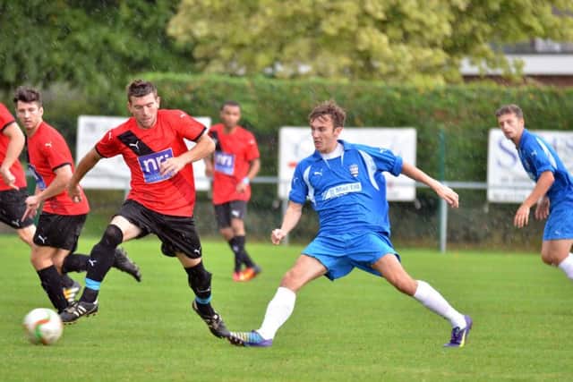 Action from Bourne's (red) 2-1 win over Irchester.