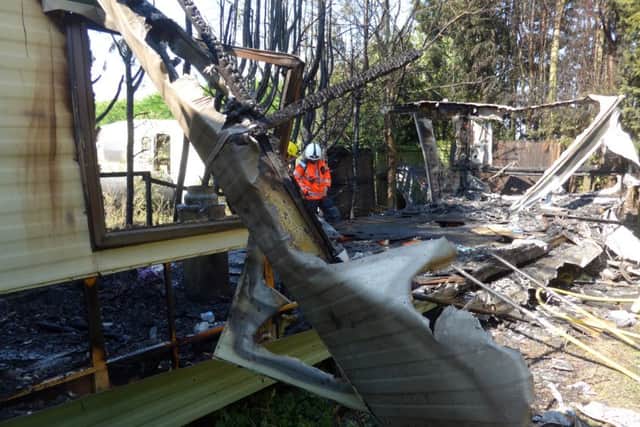 The remains of one of the caravans in Elm