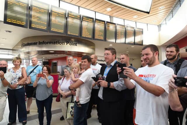 British Rail train drivers who are having their heads shaved by hairdresser Hayley Hindle in aid of Katie Rickett Work collegues and families watching EMN-160831-214053009