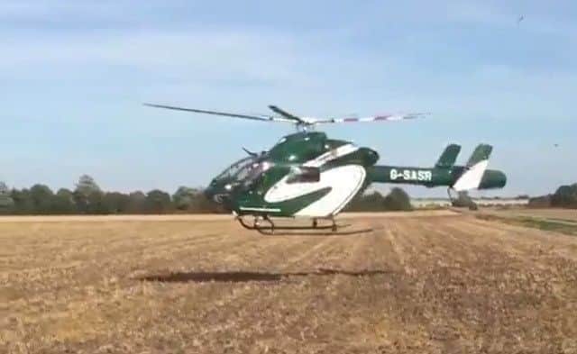 The Magpas Air Ambulance taking off from the scene at Wimblington this afternoon