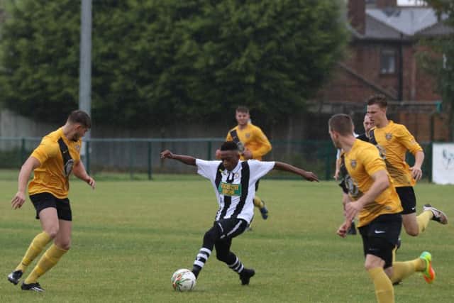 Erik Makate on the ball for Peterborough Northern Star against Harborough. Photo: Tim Gates.