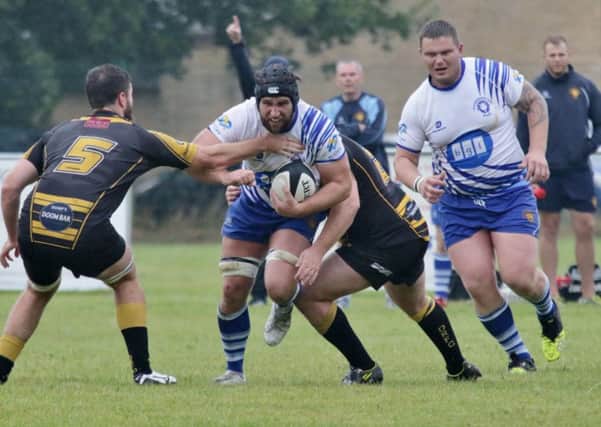 Chris Humphrey drives forward for the Lions against Derby. Picture: Mick Sutterby