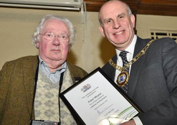 Civic Awards at Peterborough Town Hall. Peter Moyse from the John Clare Society gets the lifetime achievement award from Mayor EMN-160225-165316009