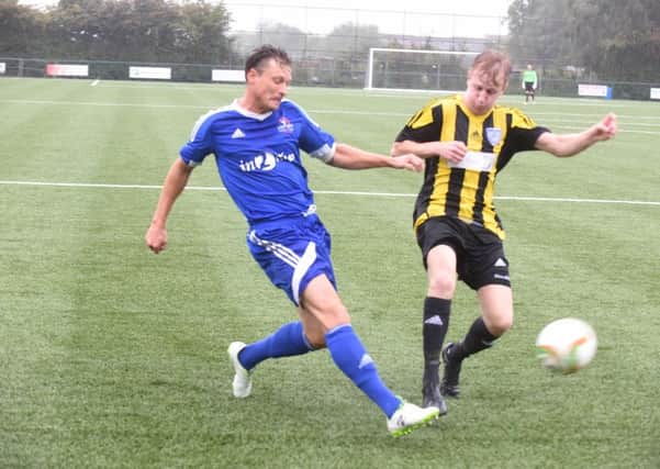 Action from Yaxley's 7-0 FA Vase win over Eynesbury. Photo: David Lowndes.