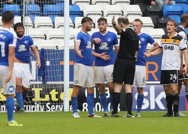 Posh defender Andrew Hughes is sent off in the match against Port Vale. Photo: Joe Dent/thposh.com.