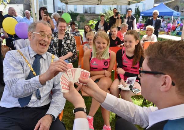 Whittlesey Festival -  Whittlesey Mayor Alex Miscandlon with magician Ricky Lock EMN-161109-183909009