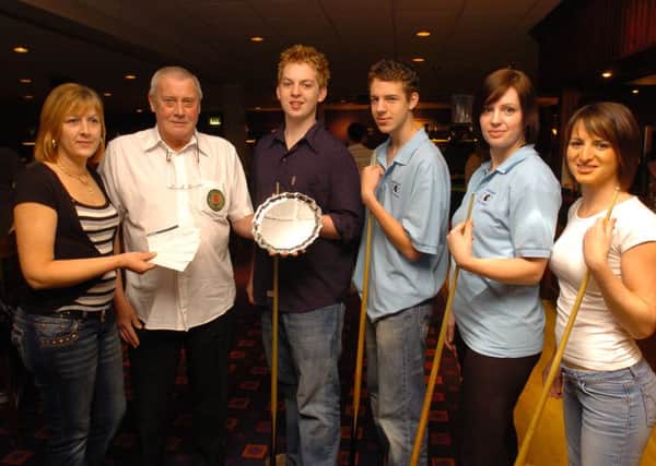 Ron Nesbitt pictured at a Peterborough Pool Association sponsorship presentation at Rileys in Eastfield Road. From the left are Sarah Cook, Ron Nesbitt, Tom Hall, Jamie Stokes, Liz Disney and Carly Smith.