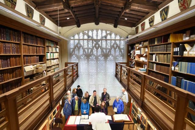 Heritage open days in Peterborough.  Visitors at the library at Peterborough Cathedral EMN-161109-100156009
