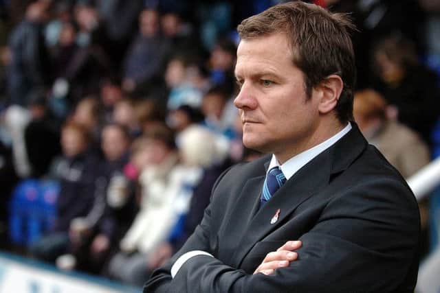 Darragh MacAnthony sacked Mark Cooper as Posh boss after 13 games in charge.