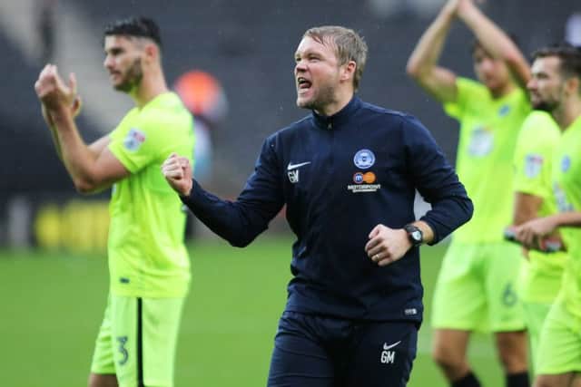 Grant McCann is the eight manager to be appointed by Posh chairman Darragh MacAnthony.