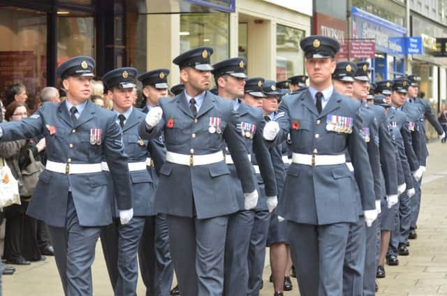 RAF personnel from RAF Wittering march through Peterborough on Remembrance Day last year