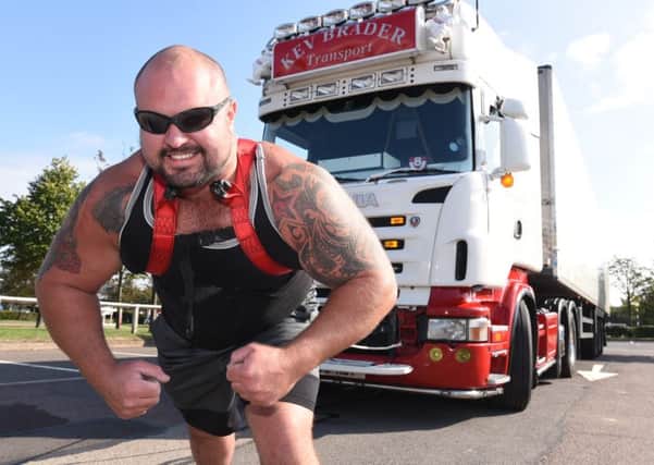 Strongman Bob McStay preparing for his lorry pull