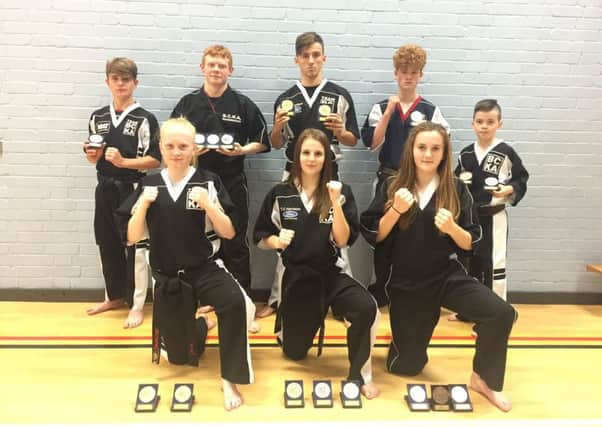 The Peterborough BCKA fighters who did well at the European Championships. From the left are, back, Eddy Paddock, Zac Culpin, Leon Gold, Sam Spencer, Ashton Brannigan, front, Freya Molloy, Jaden Harris and Abi Daulton.