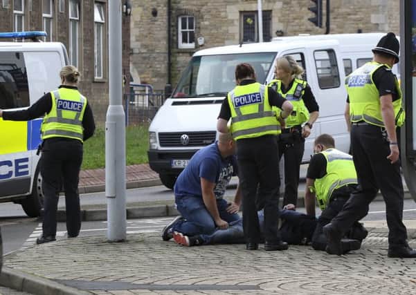 Police make an arrest in the City Centre,
City Centre, Peterborough
20/09/2016. 
Picture by Terry Harris. THA