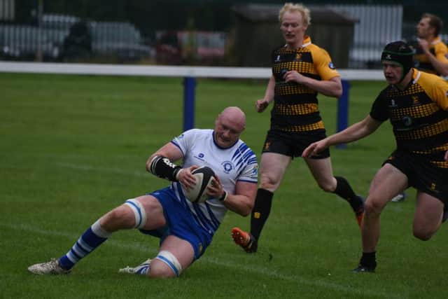 Pete Kolakowski scores a try for the Lions. Picture: Kevin Goodacre