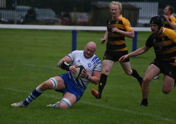 Pete Kolakowski scores a try for the Lions. Picture: Kevin Goodacre
