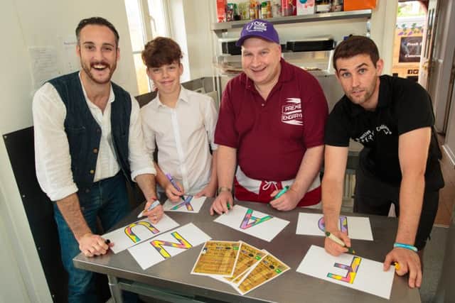 Preparing for the fun day are, from left, Joe Vine, Nathan Brader, Francis Bowers, of Premier Engraving and Ben Cuthbert, of Be You Health Studios.
