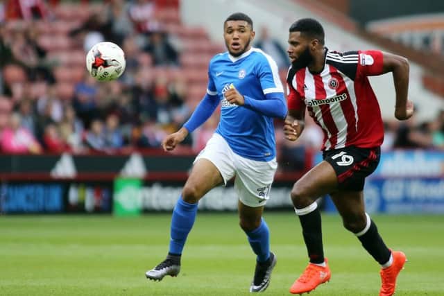 Deon Moore (left) is challenging for a Posh starting place against Walsall. Photo: Joe Dent/theposh.com.