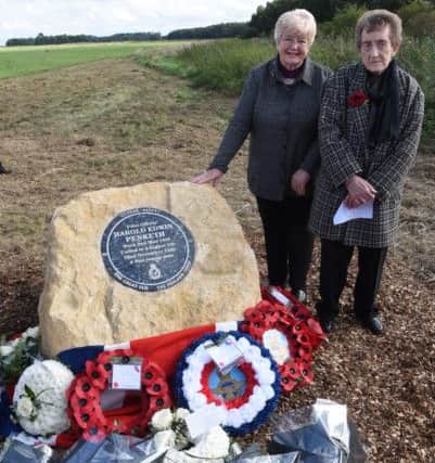 Memorial service for Pilot Officer Harold Penketh killed in a Spitfire crash in 1940 at Holme Fen.  The pilots second cousins  Valetta Cranmerven and  Sheila Morris  who attended the service EMN-160922-232328009