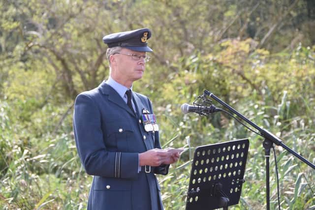 Memorial service for Pilot Officer Harold Penketh killed in a Spitfire crash in 1940 at Holme Fen.  Pictured is Flt Lt Andrew sell from RAF Wittering at the service EMN-160922-232208009