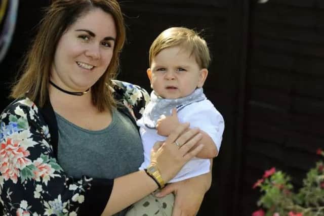 Amy Stinton, 30, with her son Oliver Stinton who is 14-months-old Picture by: Malcolm Wells (160923-2103)