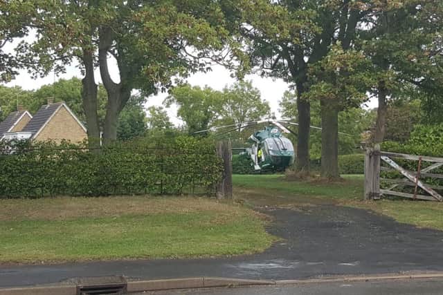 The air ambulance at the scene. Pic: Michael Duncan