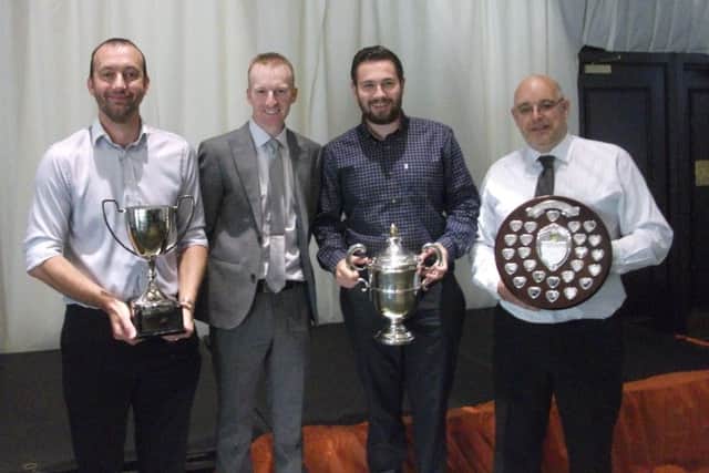World indoor singles champion Nicky Brett (second left) with three of the Parkway players who were among the honours at the Northants Federation presentation luncheon. From the left are Neil Wright (four-bowl singles and three-bowl triples), James Harford (two-bowl triples) and Howard Shipp (Champion of Champions singles).
