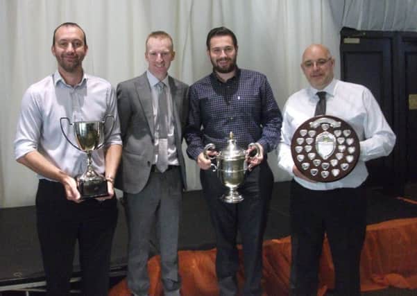 World indoor singles champion Nicky Brett (second left) with three of the Parkway players who were among the honours at the Northants Federation presentation luncheon. From the left are Neil Wright (four-bowl singles and three-bowl triples), James Harford (two-bowl triples) and Howard Shipp (Champion of Champions singles).