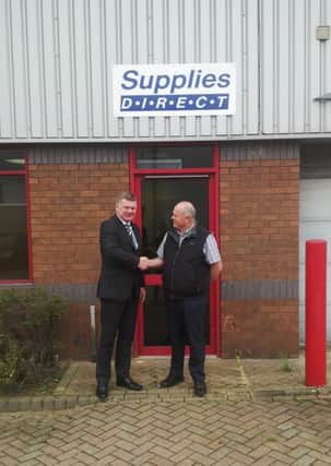 Tony Collard, of Ethos, left, with Glenn Richards, managing director of Supplies Direct.