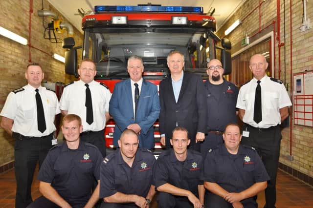 Mayor David Sanders and MP Stewart Jackson with the On Call firefighters at Thorney Fire Station EMN-160921-083500009