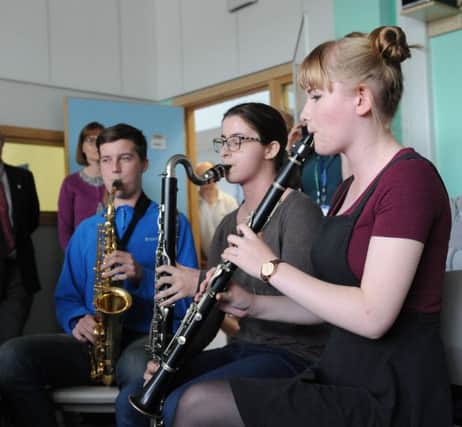 Peterborough Centre for Young Musicians at Ormiston Academy.  Ethan Malcolm, Evie Werstbrook and  Lottie Hood. EMN-160925-182717009