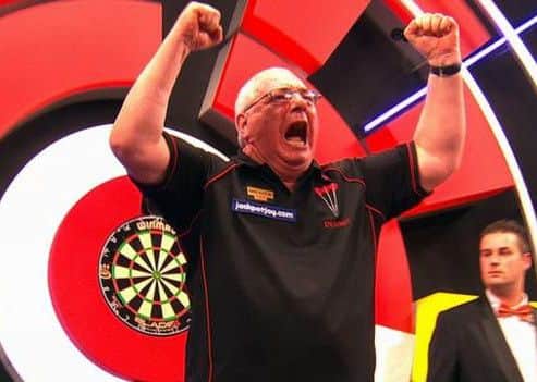 Dennis Harbour celebrates on the Lakeside stage in January.