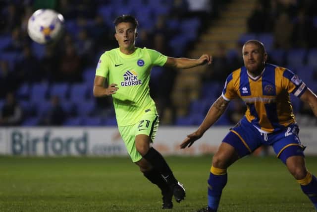 Tom Nichols of Peterborough United in action with Adam El-Abd of Shrewsbury Town - Mandatory by-line: Peterborough United Football Club Ltd / PaperPix- 2016 - 16/17 - FOOTBALL - Greenhous Meadow - Shrewsbury, Shropshire - Shrewsbury Town v Peterborough United