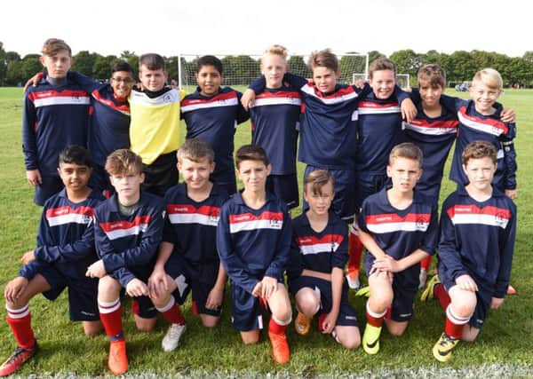 Werrington Athletic Under 13s are pictured before their  8-2 win over Glinton & Northborough Amber. From the left are, back, Jakub Szreder, Zain Meghji, Kyle Irving, Jebreel Younis, Archie Makepeace-Beach, Shaun Gear, William Barfield, Charlie Allport, Isaac Shaw, front, Ali Ismail, Tom Nash, Tyler Harper, Rivell Koboci, Hayden Jelfs, William Sheffield and Callum Kerr-Gray.